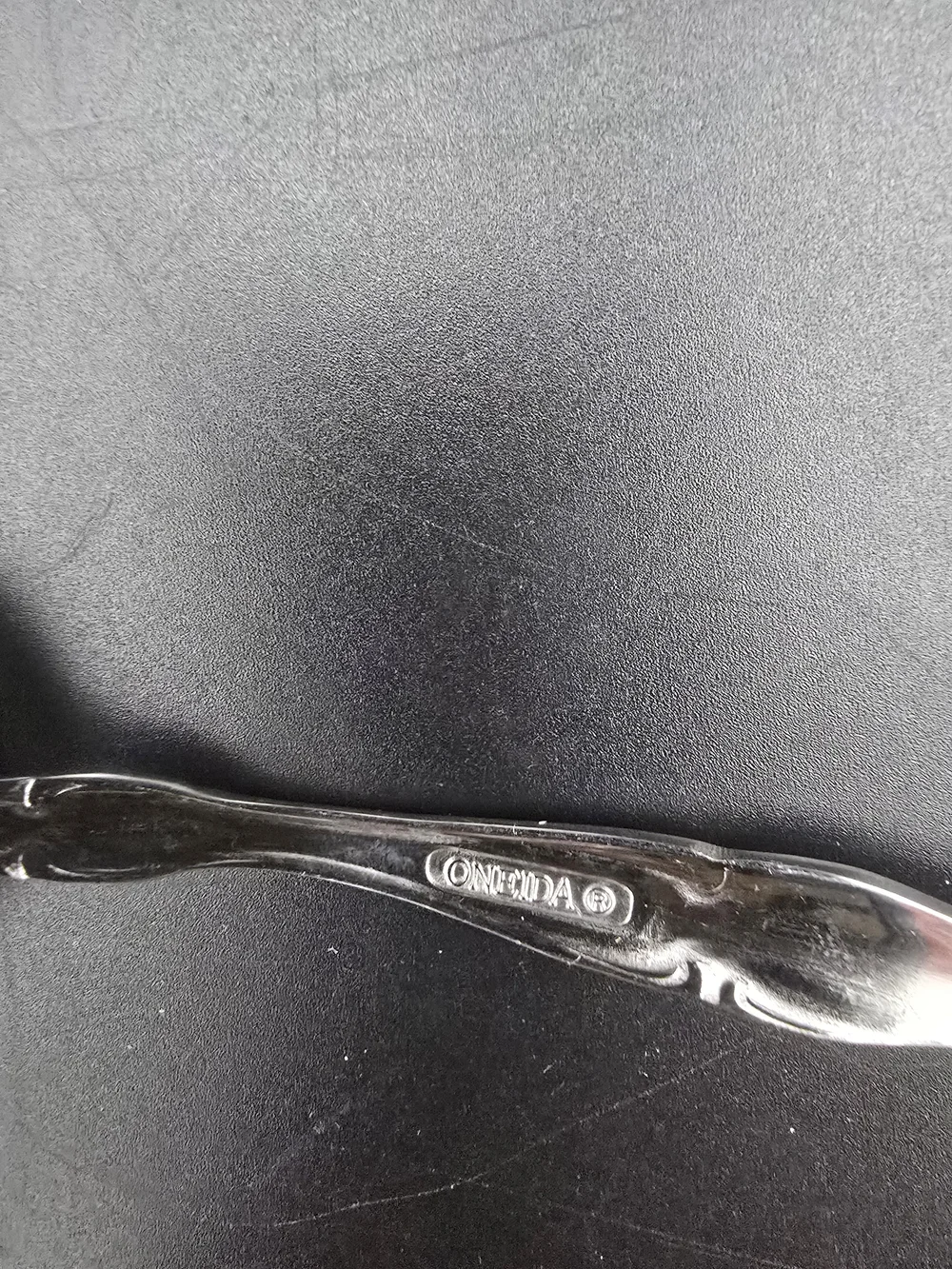 Oneida Silver Tone Ornate Serving Spoon